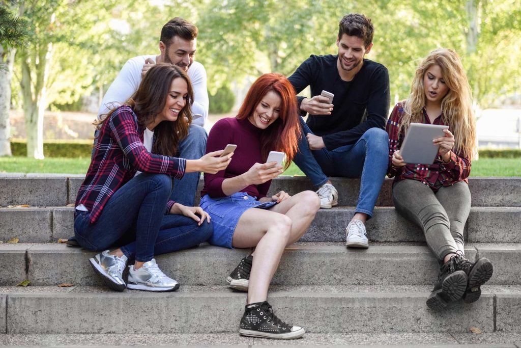 A group of people engage on social media