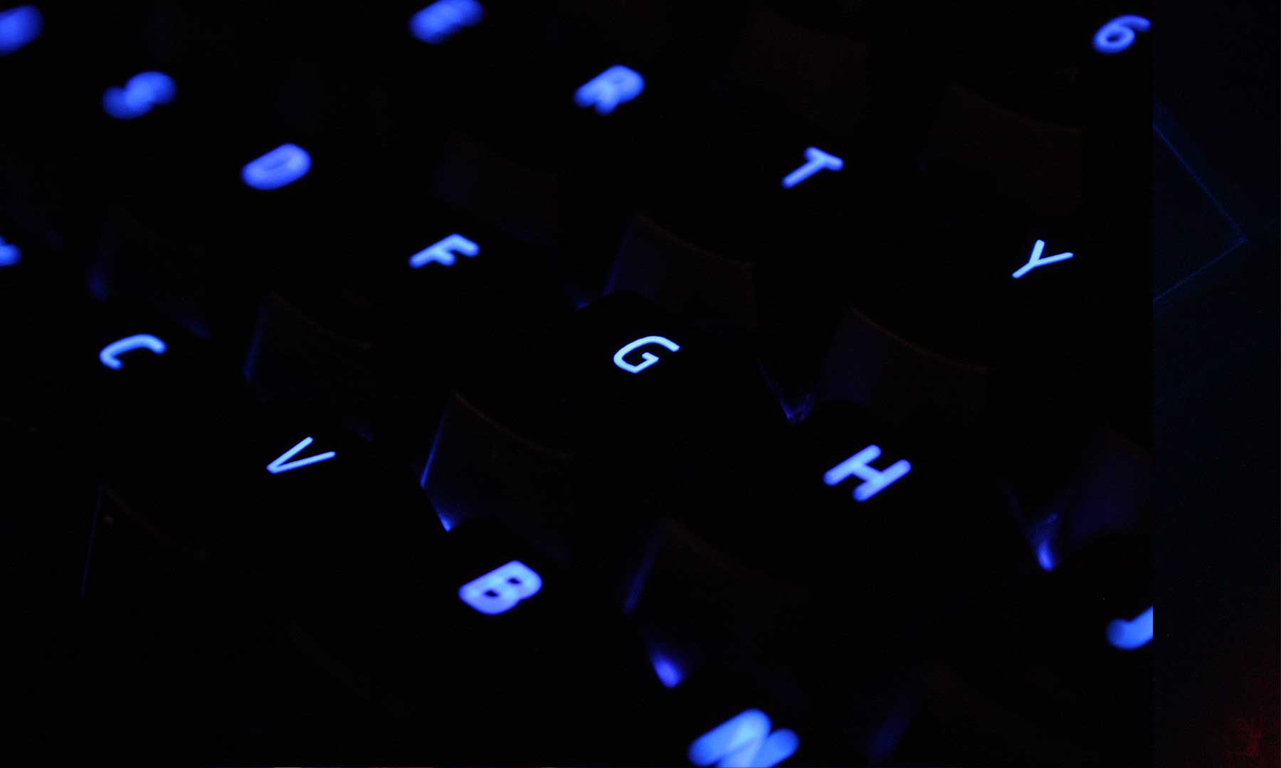 Modern keyboard keys with blue lights